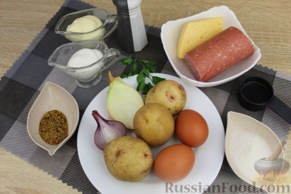 Салат с колбасой, картофелем, сыром и яйцами